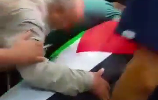 Thumbnail preview image for the video titled: Father embraces his son, Mashhour Yassin, for the last time after he was killed by settler gunfire in Yasuf.