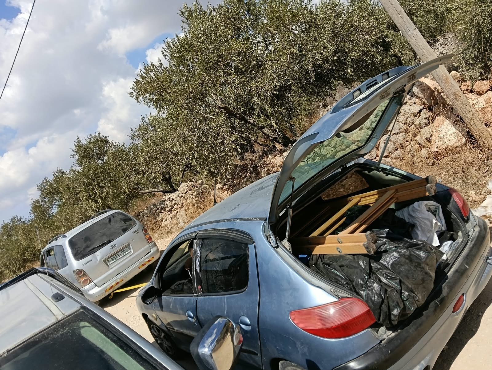 Thumbnail preview image for the video titled: Vehicles dammaged after Israeli settlers attacked residents picking olives in several villages and towns across the Nablus governorate