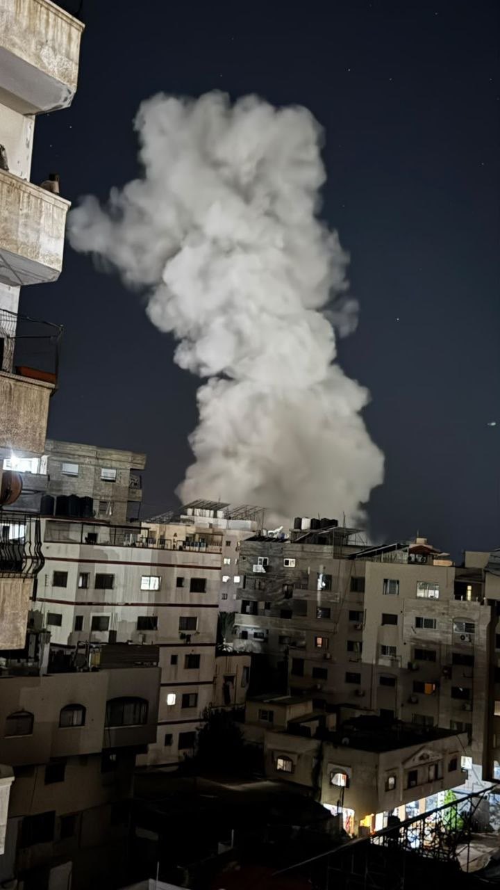 Thumbnail preview image for the video titled: Smoke rises after Israel bombed a residential building in western Gaza City