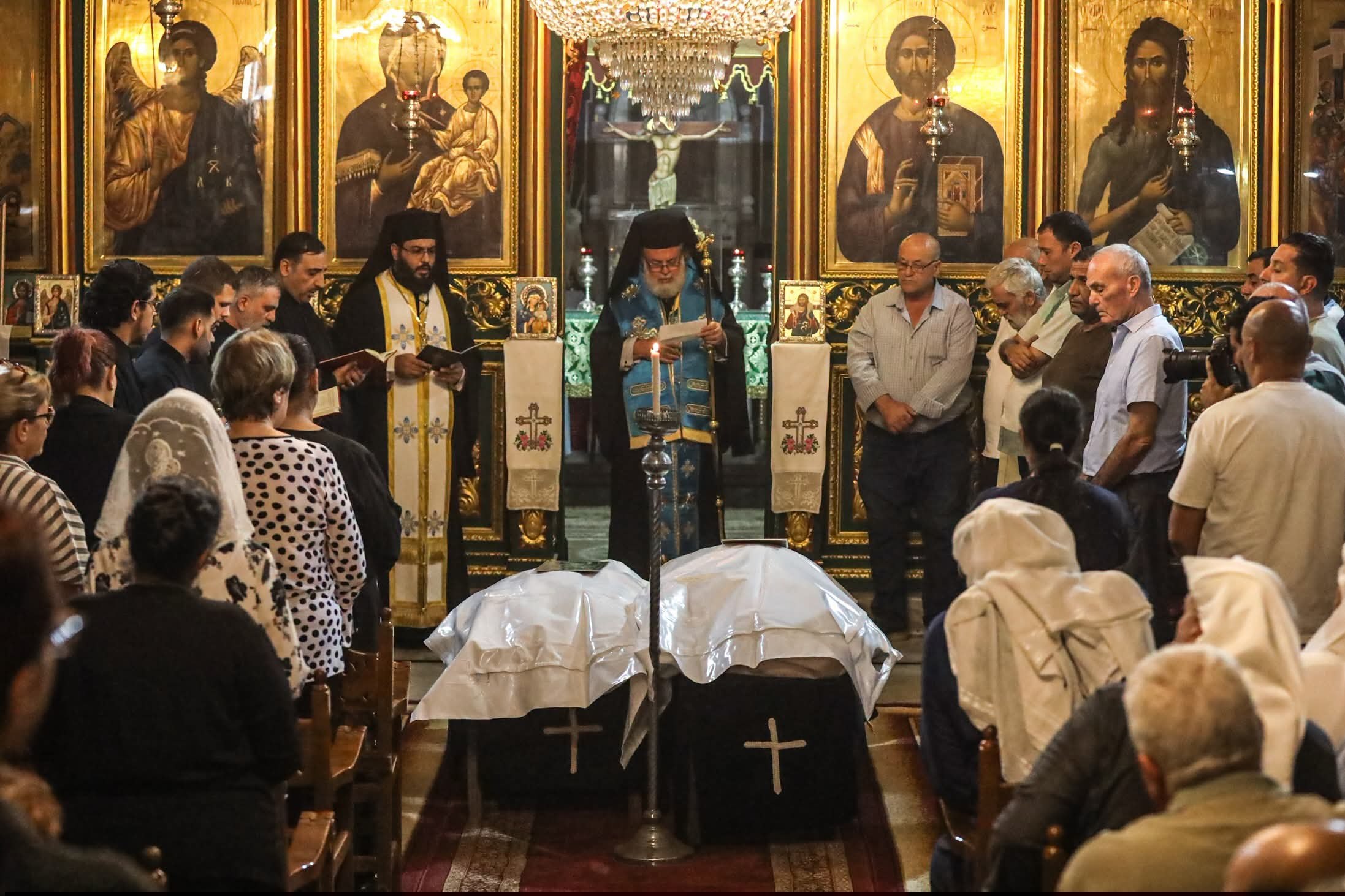 Thumbnail preview image for the video titled: Funeral of Christian mother and daughter killed by Israel's bombing of their apartment in Gaza City