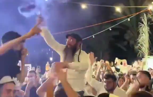 Thumbnail preview image for the video titled: Rabbi and jewish crowd dance to genocidal son "May Your Village Burn"