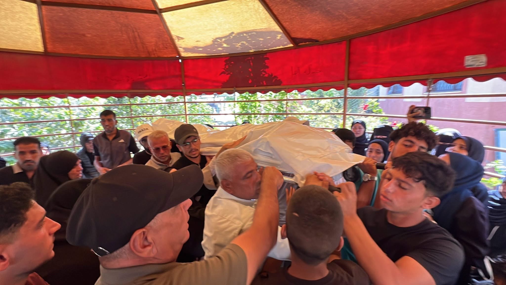 Thumbnail preview image for the video titled: Family bids farewell to police lieutenant killed by Israel in the "safe zone"