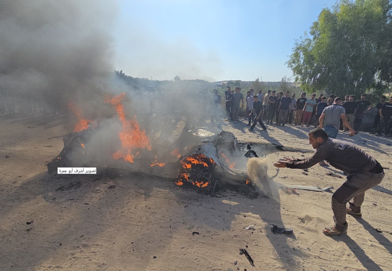 Thumbnail preview image for the video titled: Car of aid coordinator ablaze after deadly Israeli drone strike
