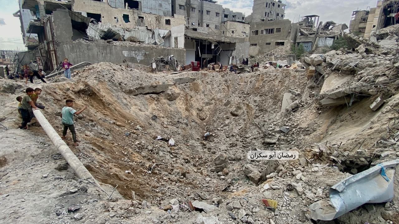 Thumbnail preview image for the video titled: Crater left in the wake of Israel's bombing of house in the Sabra neighborhood