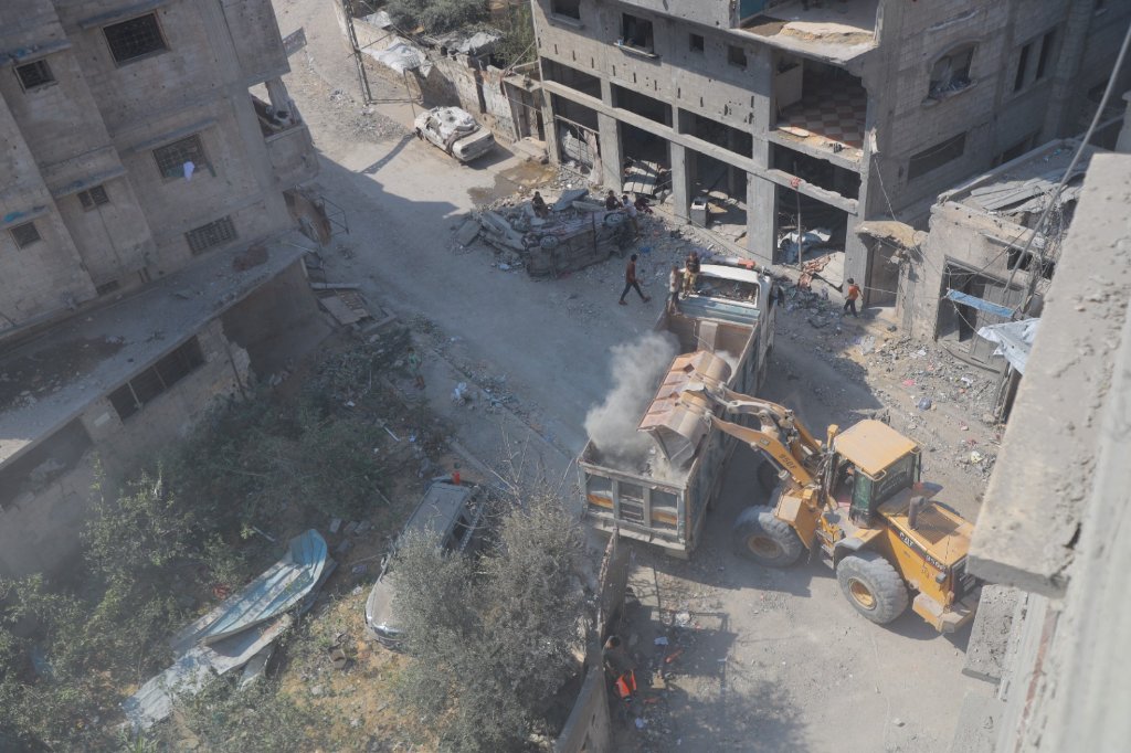 Thumbnail preview image for the video titled: Gaza Municipality crews begin clearing rubble from Israel's violent bombing of residential block