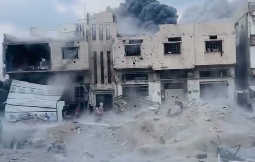 Thumbnail preview image for the video titled: First moments after Israeli bombing of buildings in the Shujaiya neighborhood