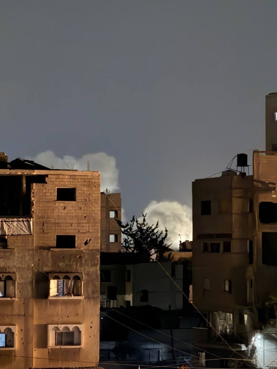 Thumbnail preview image for the video titled: Smoke rises after Israeli forces blew more houses in the Shujaiya neighborhood