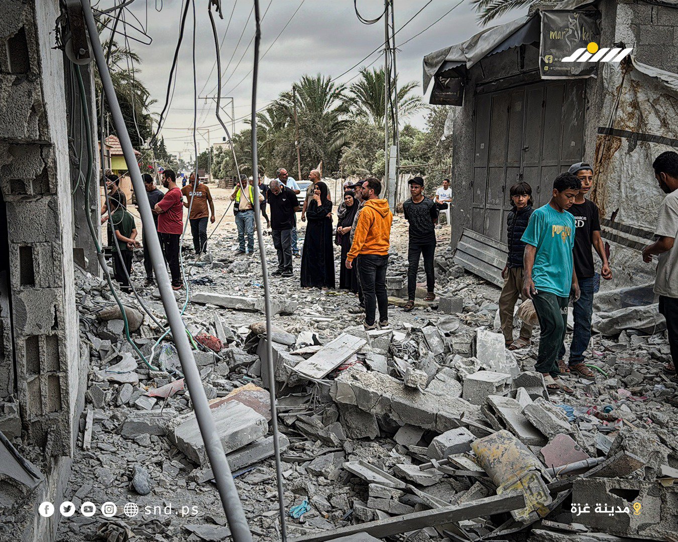 Thumbnail preview image for the video titled: Palestinians inspect what remains of their belongings after late night Israeli bombing of a house in central Gaza