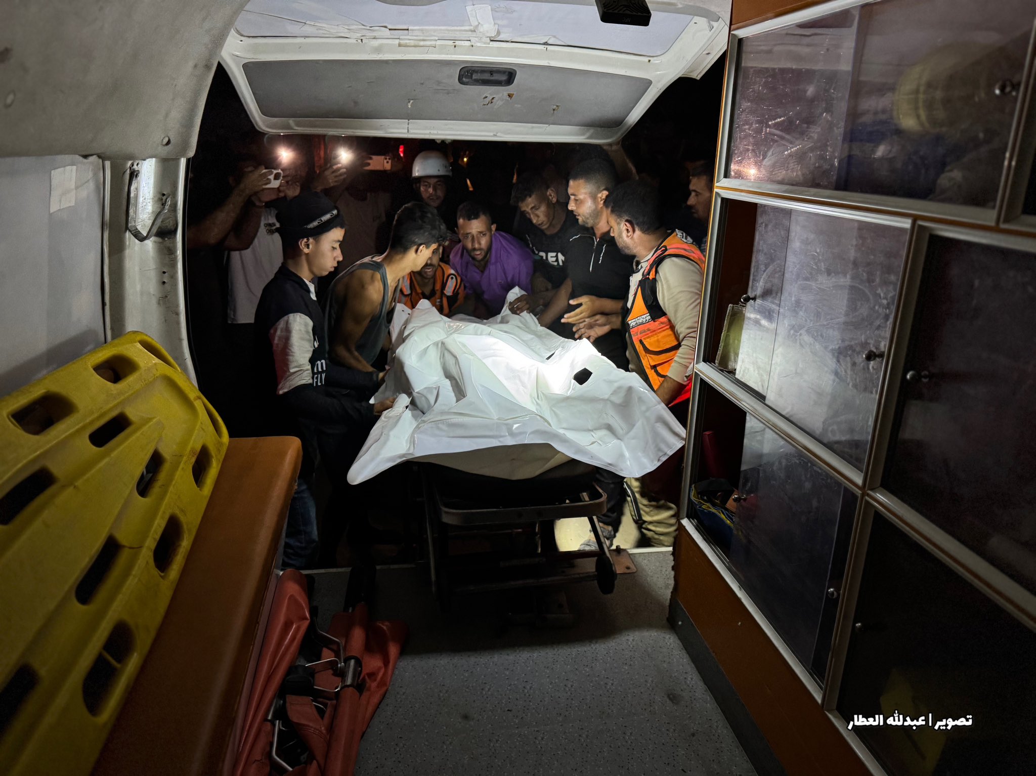 Thumbnail preview image for the video titled: Rescue crews recover the bodies of Palestinians killed by Israeli strike on tent in Khan Younis