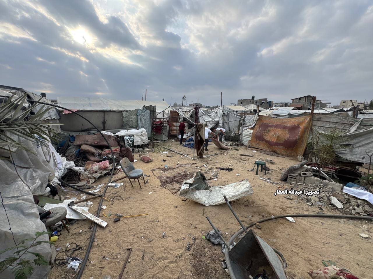 Thumbnail preview image for the video titled: Aftermath of deadly Israeli strike on tent in Khan Younis that killed 3 young men