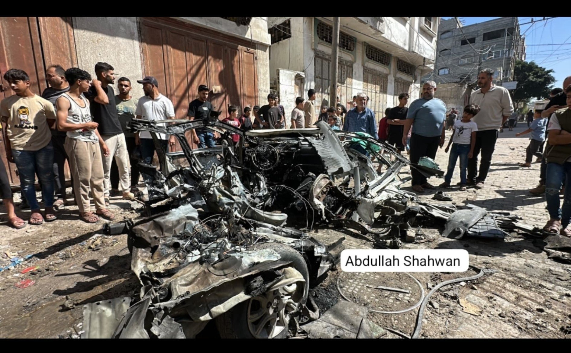 Thumbnail preview image for the video titled: Wreckage of car burnt down in deadly Israeli drone strike in eastern Gaza City