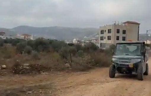 Thumbnail preview image for the video titled: Avishay Melat Palestinian farmers from accessing their own lands to harvest olives near Turmus Ayya