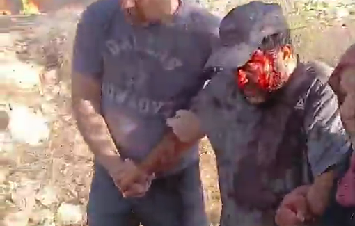 Thumbnail preview image for the video titled: Israeli settler terrorizing the farmers picking olives in Turmus Ayya