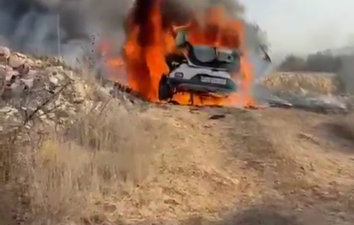 Thumbnail preview image for the video titled: A vehicle is engulfed in flames after Israeli settler attacked Palestinian farmers in Turmus Ayya