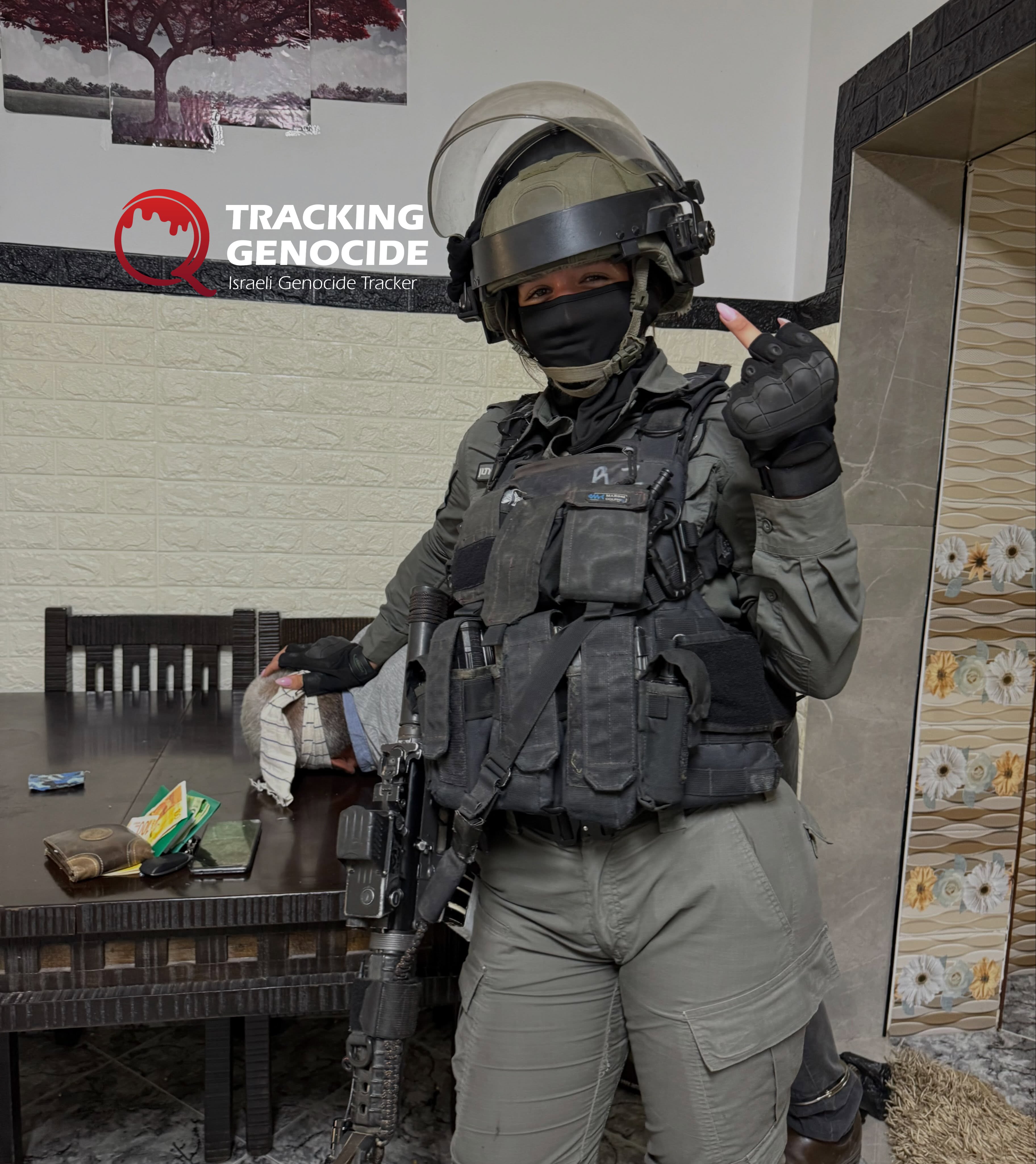 Thumbnail preview image for the video titled: Female soldier smilingly abuses elderly Palestinian after raiding his home