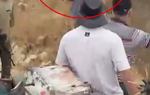 Thumbnail preview image for the video titled: An Israeli settler blocked Palestinians from their olive grove and threatened them at gunpoint