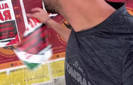 Thumbnail preview image for the video titled: Israeli travel influencer Ohad the Nomad tearing down "All Eyes On Rafah" posters in Sicily