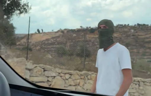 Thumbnail preview image for the video titled: Protective presence vehicle surrounded in Taybeh before being assaulted by Jewish settlers