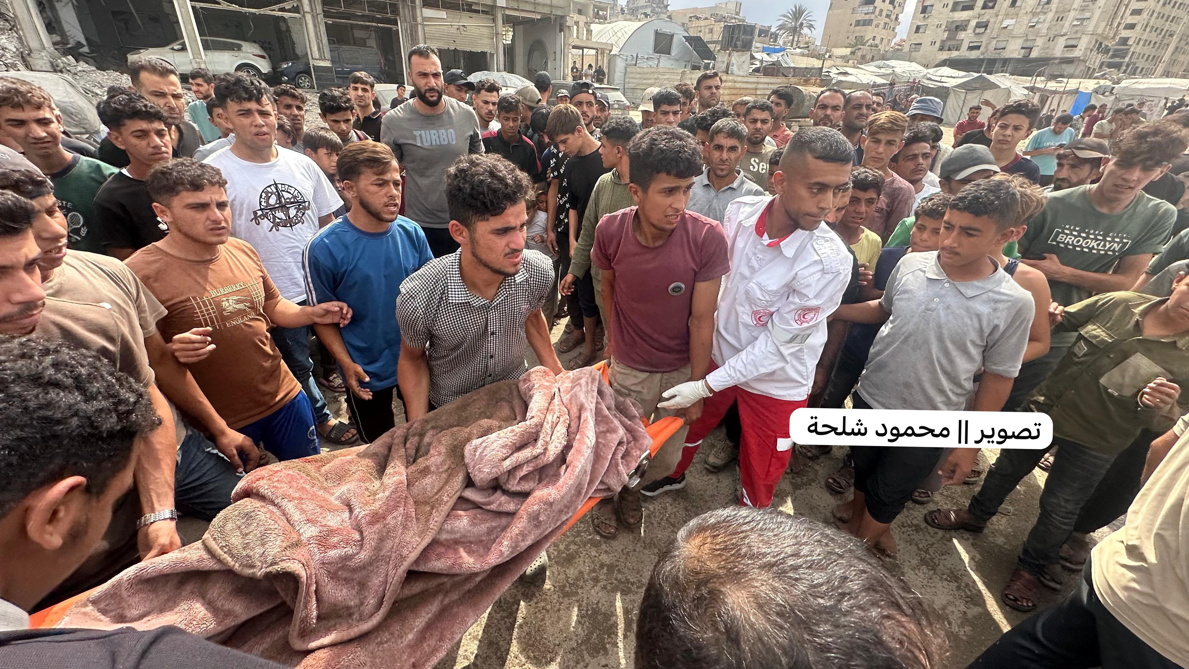 Thumbnail preview image for the video titled: Body of young Palestinian killed by Israeli strike near tents in west Gaza City