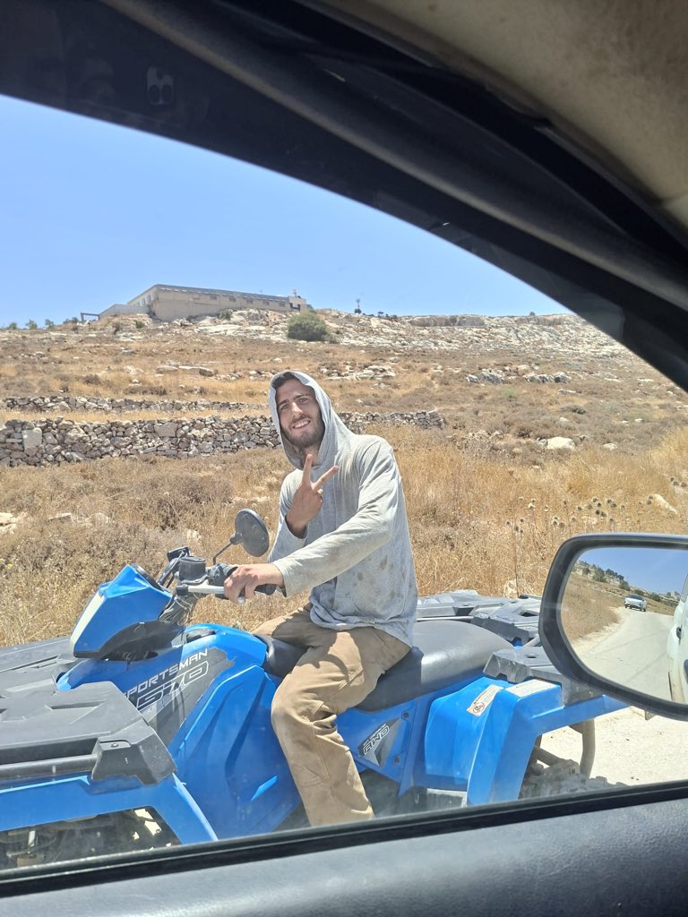 Thumbnail preview image for the video titled: The settler Nadav Cohen Tzemach patrolling near his outpost on the outskirts of Taybeh