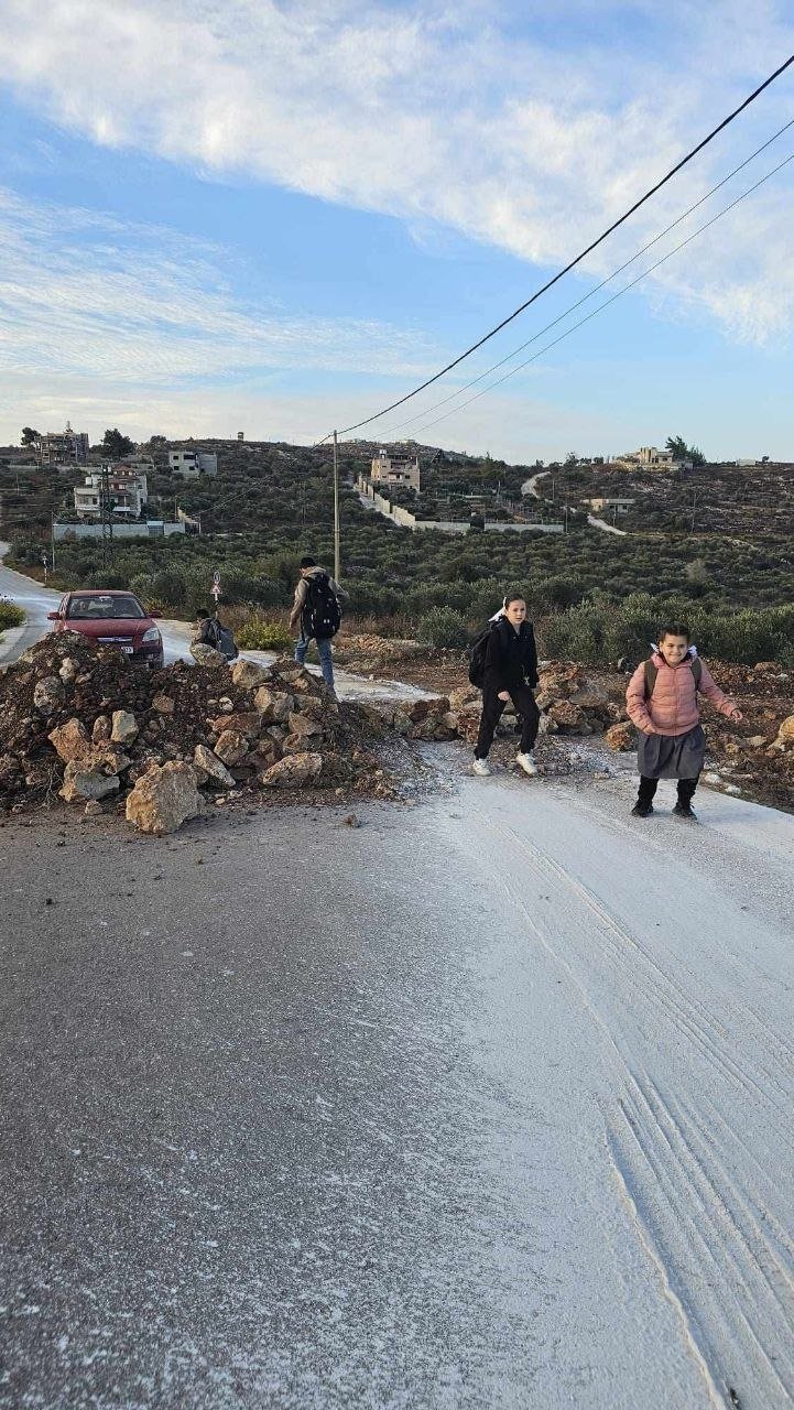 Thumbnail preview image for the video titled: Settlers blocking the main road leading to schools in the Beir Qoza area of Beita, south of Nablus