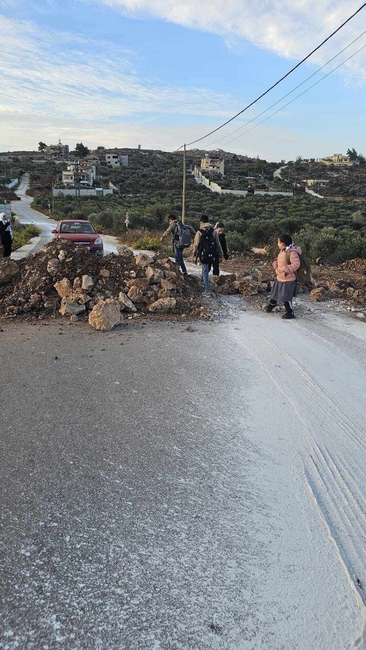 Thumbnail preview image for the video titled: Settlers blocking the main road leading to schools in the Beir Qoza area of Beita, south of Nablus