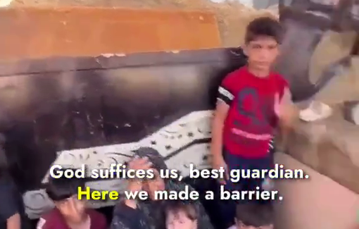 Thumbnail preview image for the video titled: Displaced family takes cover from Israeli gunfire in a trench and sand berm they built amid tents