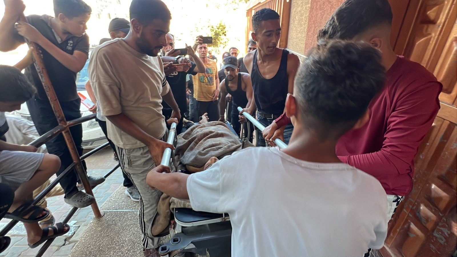 Thumbnail preview image for the video titled: Body of minor brought to hospital after he was killed by Israeli drone strike