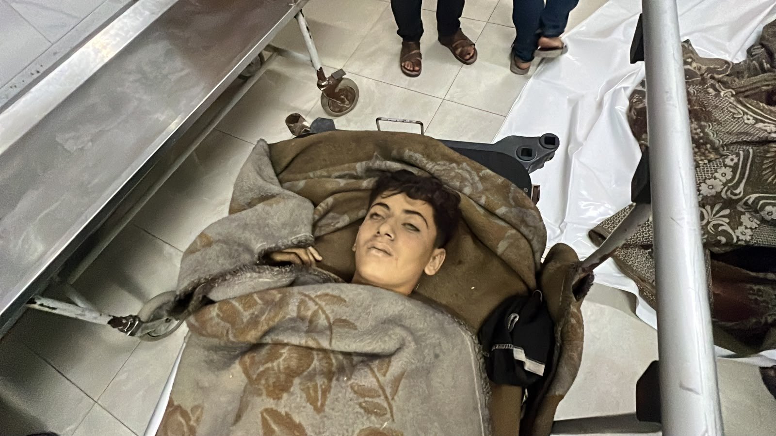 Thumbnail preview image for the video titled: Body of minor brought to hospital after he was killed by Israeli drone strike