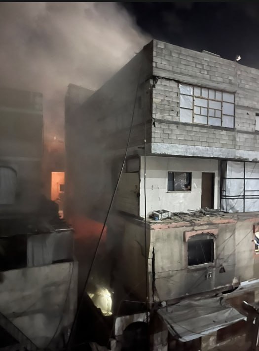 Thumbnail preview image for the video titled: Fire breaks out after late night Israeli airstrike on an apartment