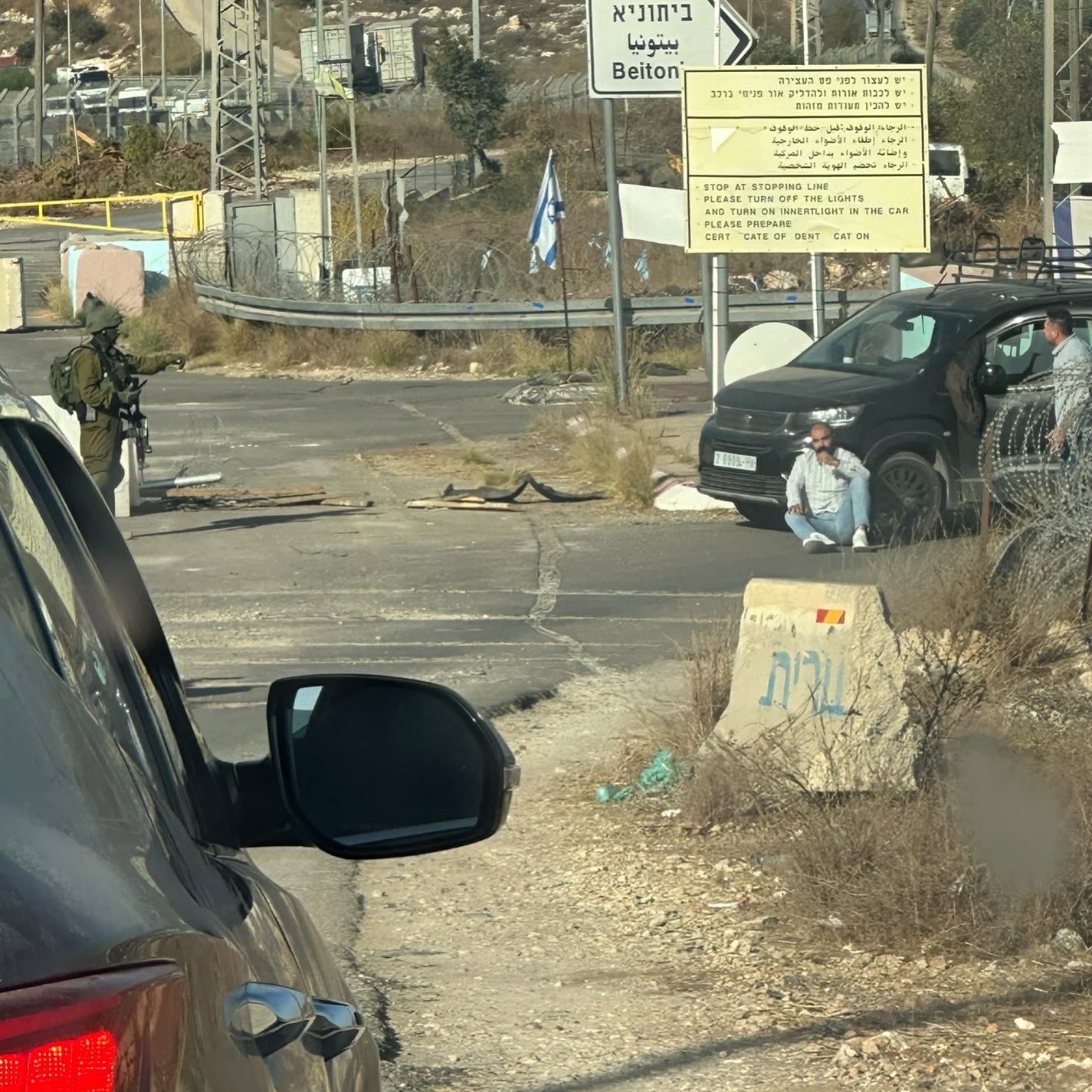Thumbnail preview image for the video titled: Israeli forces detaining and abusing civilians at a military checkpoint west of Ramallah