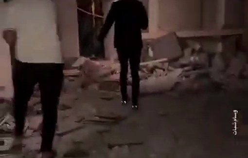 Thumbnail preview image for the video titled: Civilians search for people inside apartment bombed by Israel at 3 am