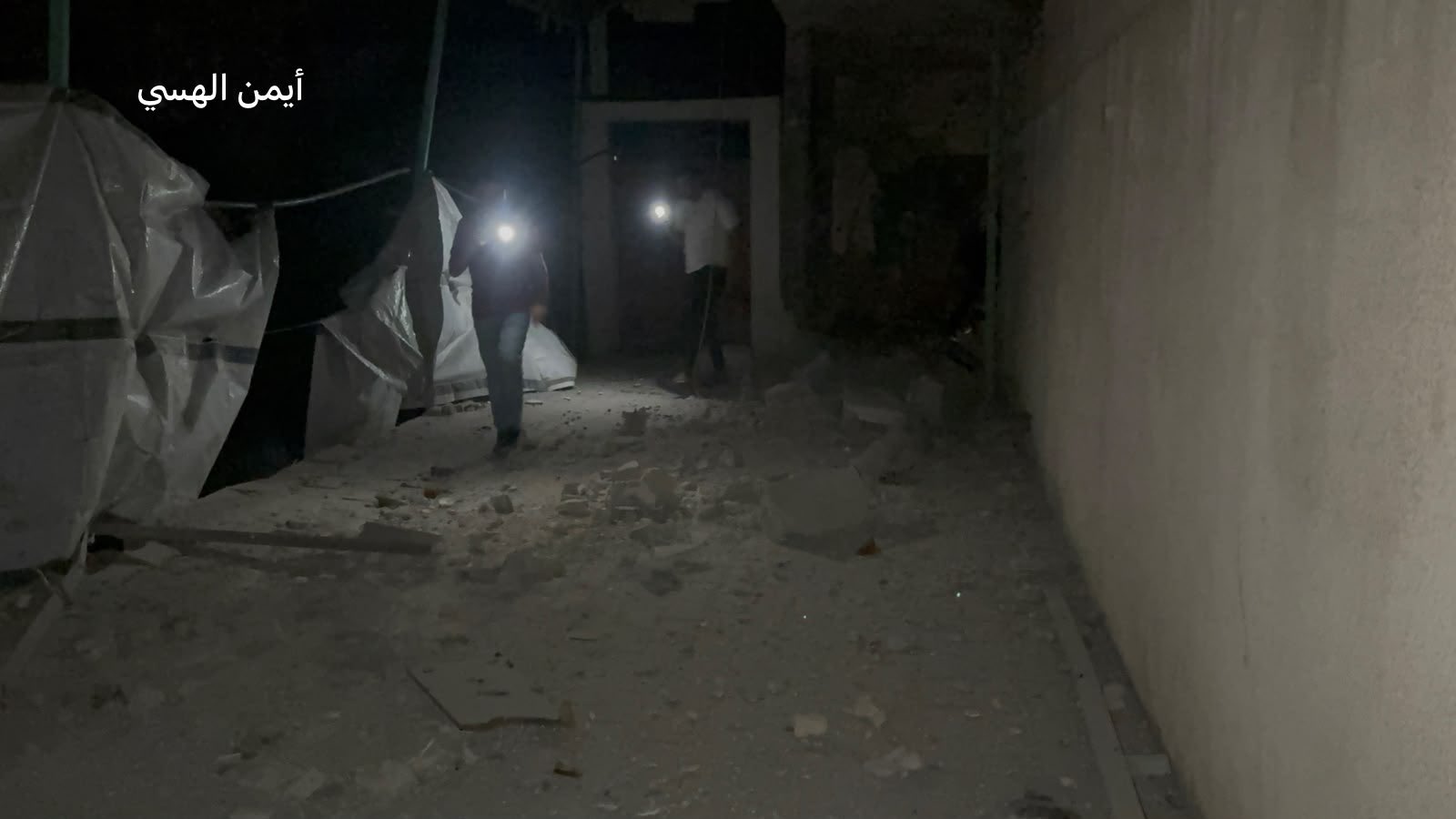 Thumbnail preview image for the video titled: Civilians search for people inside apartment bombed by Israel at 3 am