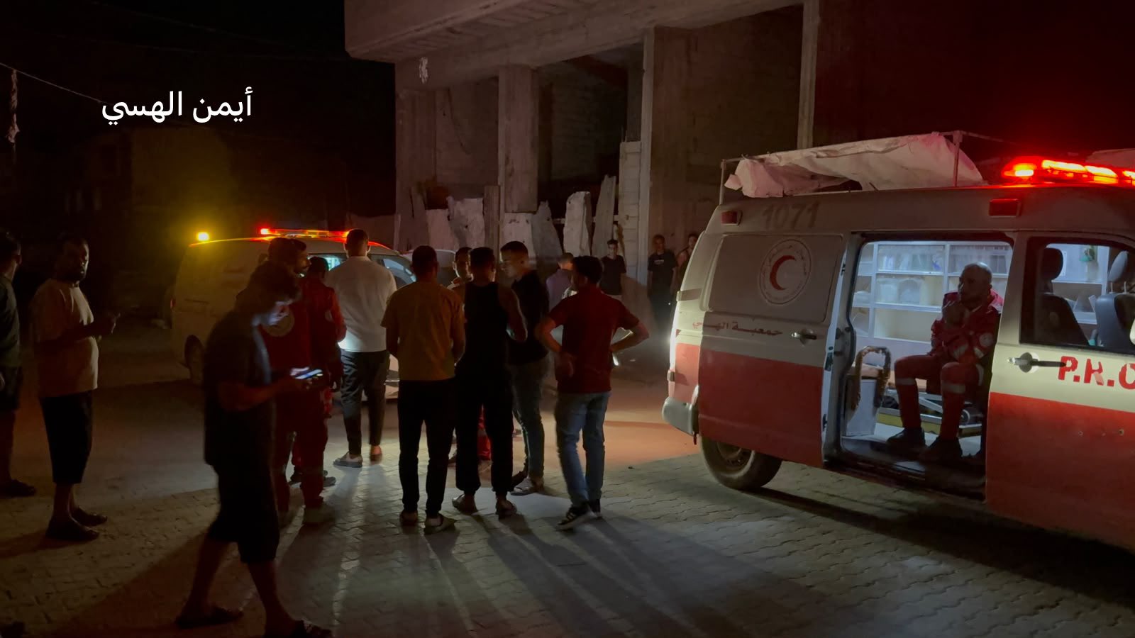 Thumbnail preview image for the video titled: Rescue teams arrive on scene following Israeli pre-dawn bombing of an apartment