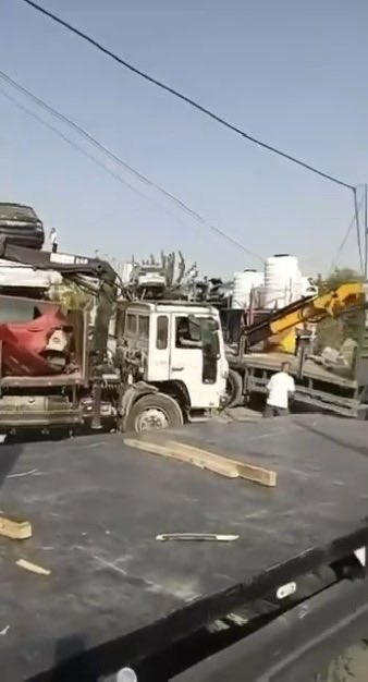 Thumbnail preview image for the video titled: Business owners in Hebron’s Farsh al-Hawa area evacuate their premises as Israeli forces begin demolitions