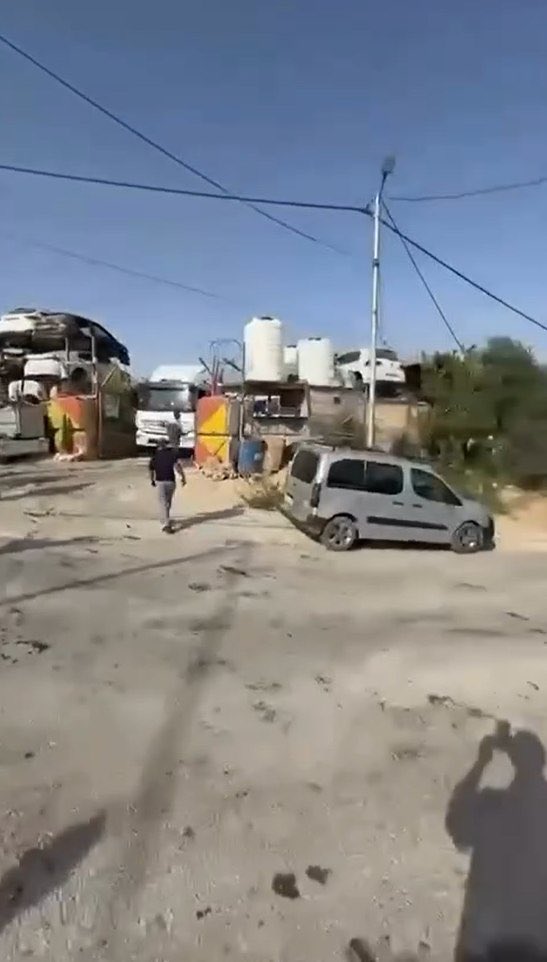 Thumbnail preview image for the video titled: Business owners in Hebron’s Farsh al-Hawa area evacuate their premises as Israeli forces begin demolitions