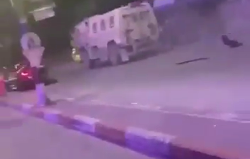 Thumbnail preview image for the video titled: An Israeli military vehicle rams a Palestinian vehicle while storming the Rafidia neighborhood