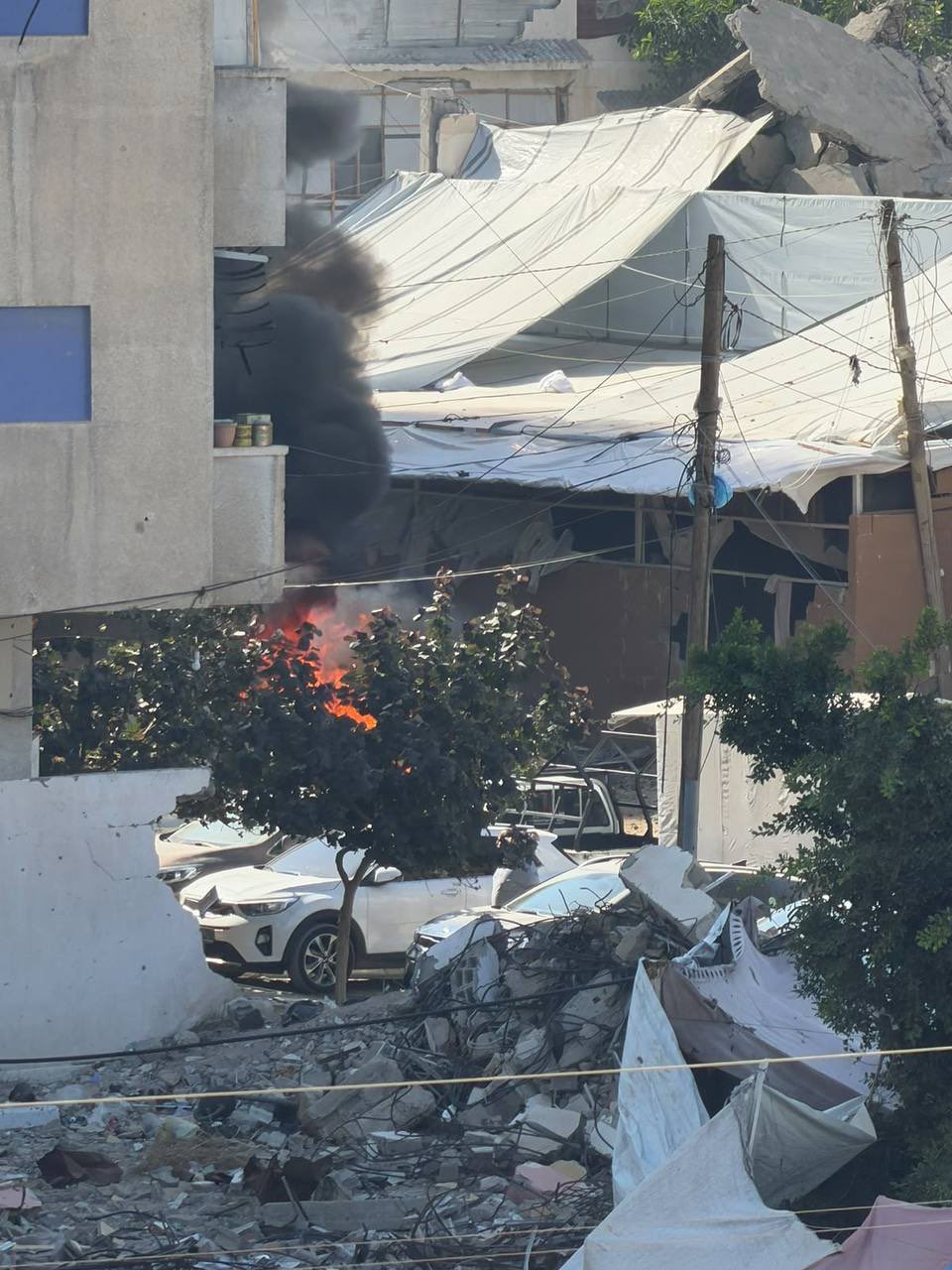 Thumbnail preview image for the video titled: Car on fire following deadly airstrike in Tal al-Hawa