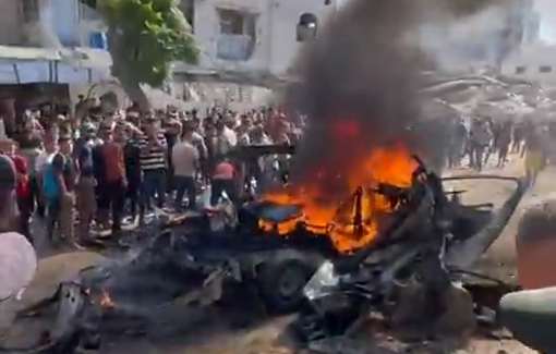 Thumbnail preview image for the video titled: Car on fire following deadly airstrike on police officer in Tal al-Hawa