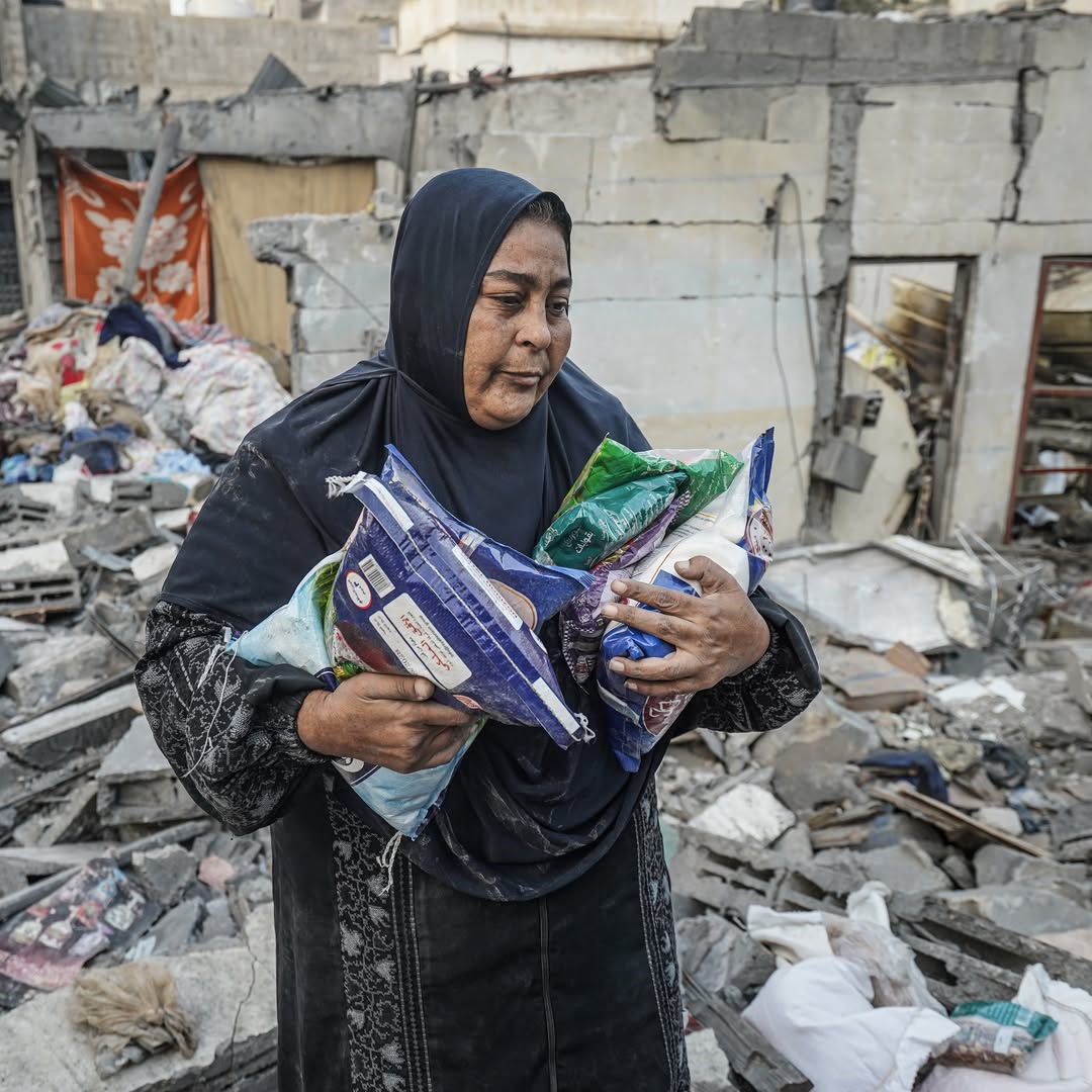 Thumbnail preview image for the video titled: Searching the rubble for items to salvage after Israel bombed a residential block in Nuseirat