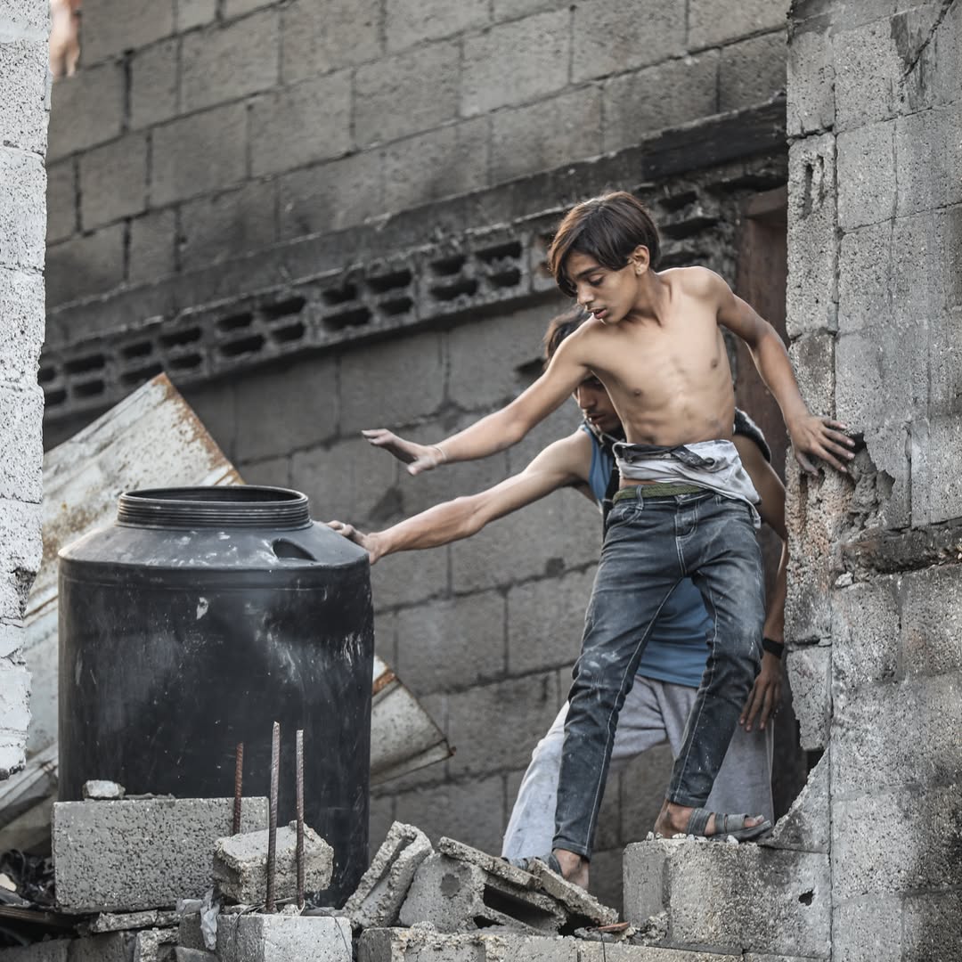 Thumbnail preview image for the video titled: Searching the rubble for items to salvage after Israel bombed a residential block in Nuseirat