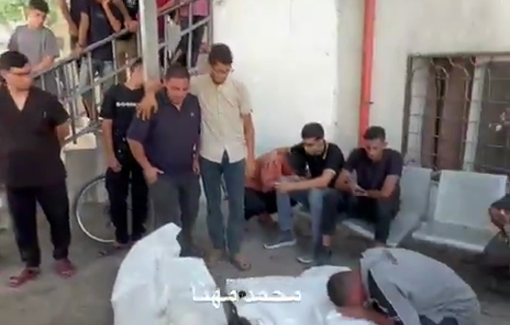 Thumbnail preview image for the video titled: Relatives mourn young Palestinians killed in Israeli drone strike on their bike
