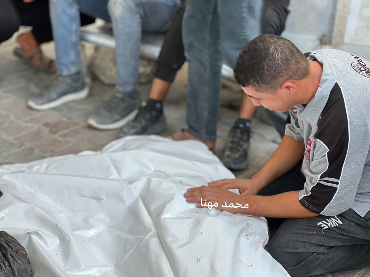 Thumbnail preview image for the video titled: Relatives mourn young Palestinians killed in Israeli drone strike on their bike