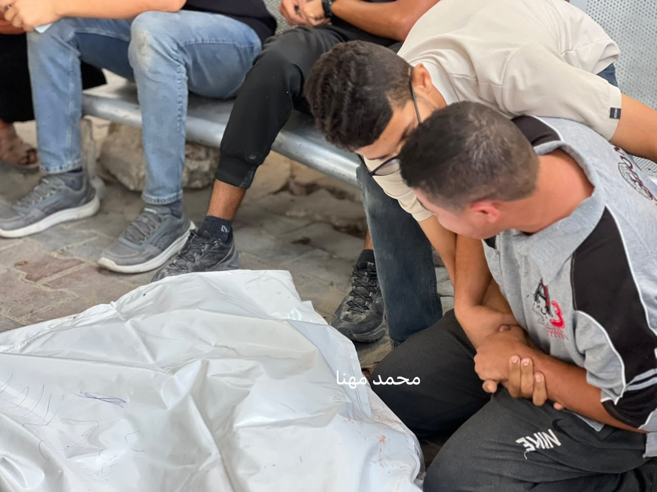 Thumbnail preview image for the video titled: Relatives mourn young Palestinians killed in Israeli drone strike on their bike