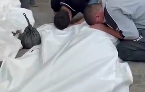 Thumbnail preview image for the video titled: Relatives mourn young Palestinians killed in Israeli drone strike on their bike