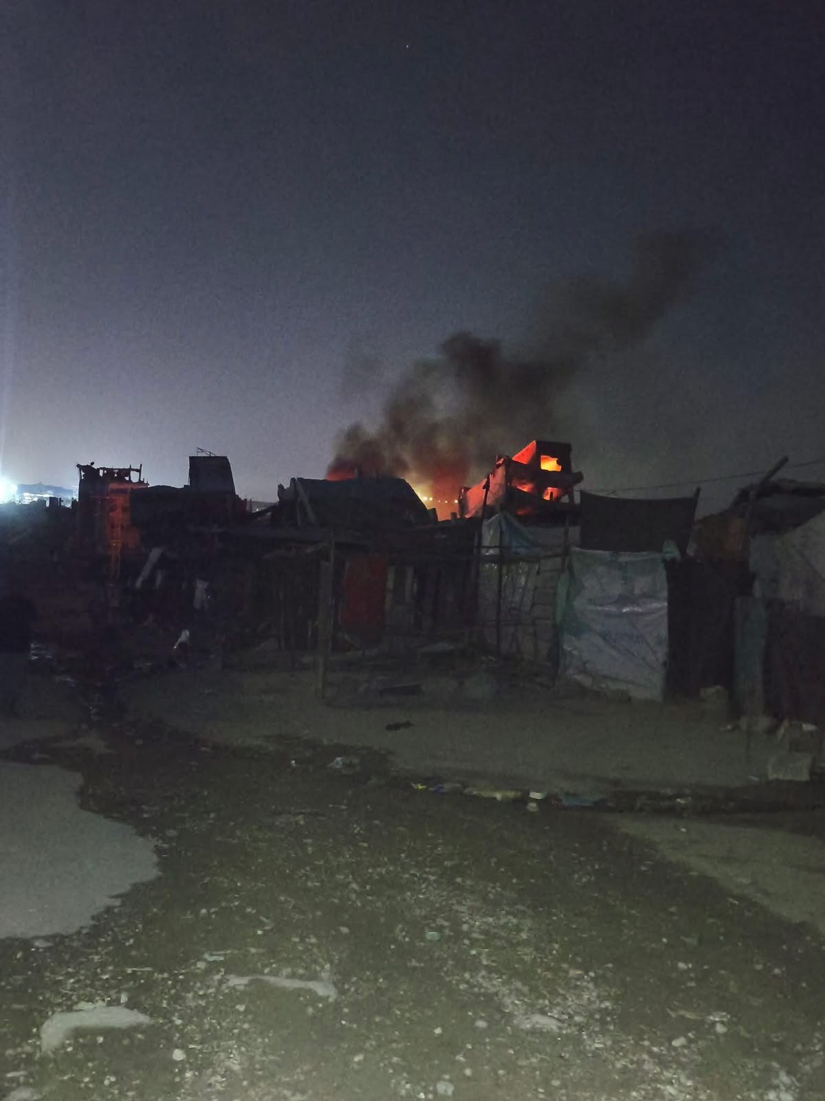 Thumbnail preview image for the video titled: Tents catch fire after Israeli drones dropped icnendiary charged on them