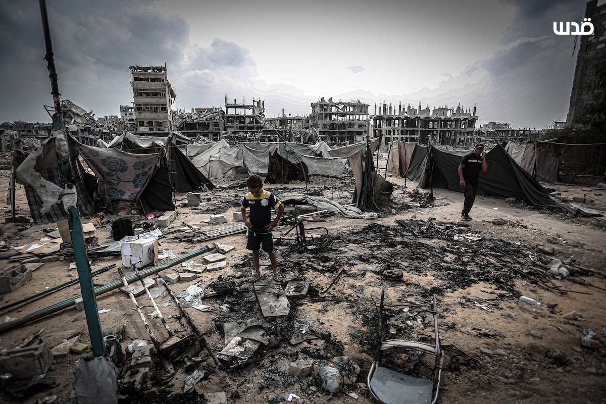 Thumbnail preview image for the video titled: Children inspect the torched remains of their tents burned down by Israeli drones