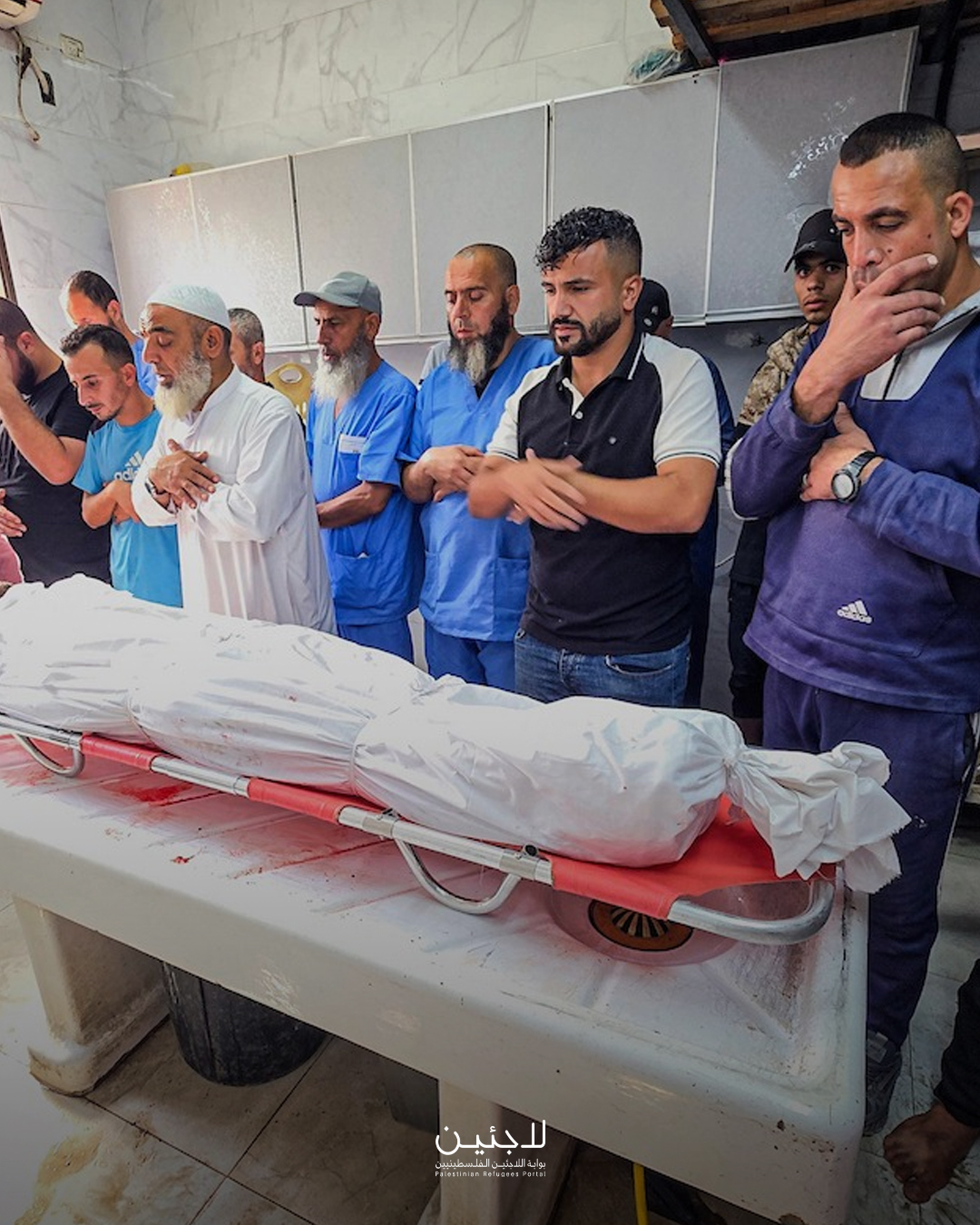 Thumbnail preview image for the video titled: Mortuary employees' funeral prayer for Palestinian killed at Al-Agha school