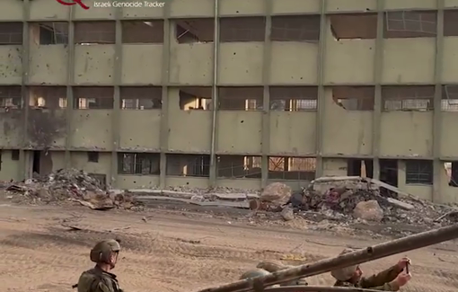 Thumbnail preview image for the video titled: Israeli soldier Refael Shein boasted of raising the Jewish Hanukkah next to a destroyed Palestinian home.